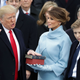 Donald Trump takes the oath of office as his wife, Melania, holds the Bible and their son, Barron, looks on Jan. 20, 2017, in Washington, D.C. (Chip Somodevilla/Getty Images)